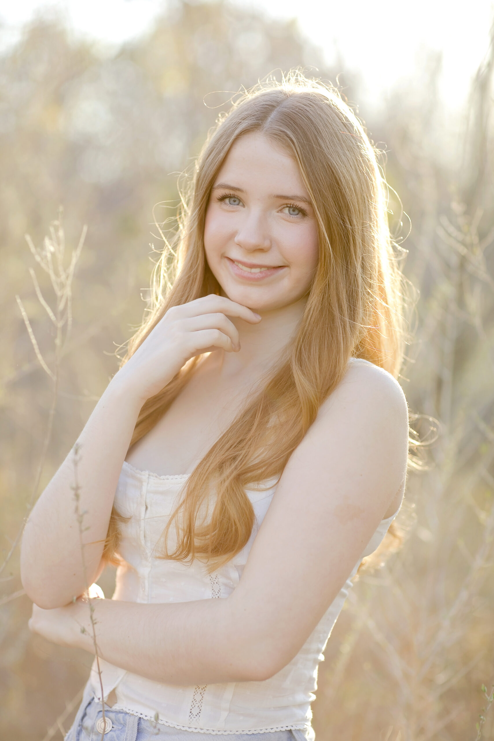 Chloe, James Bowie High School Class of 2026 senior, posing during her senior portrait session at Government Canyon on a sunny day, captured by Robin Rogers Photography.
