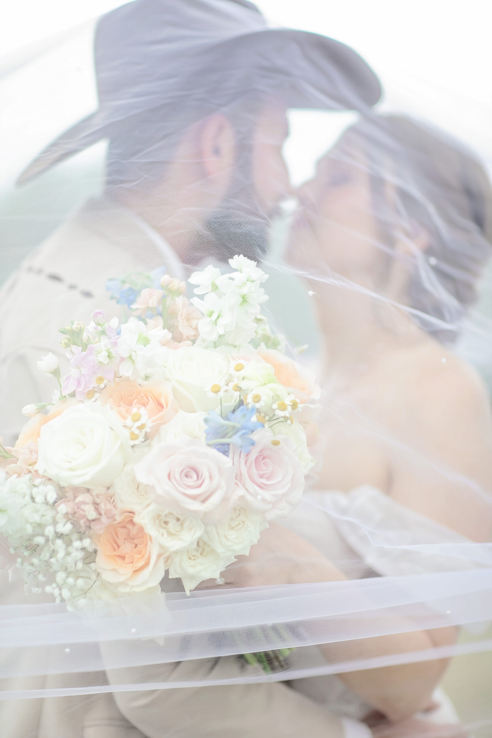 Romantic wedding ceremony at Ironwood at Von Diech in Boerne, Texas, featuring Madelyn and Jake during their Hill Country wedding celebration with soft natural light, elegant florals, and emotional candid moments.