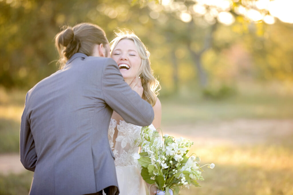 Texas Hill Country wedding couple laughing together