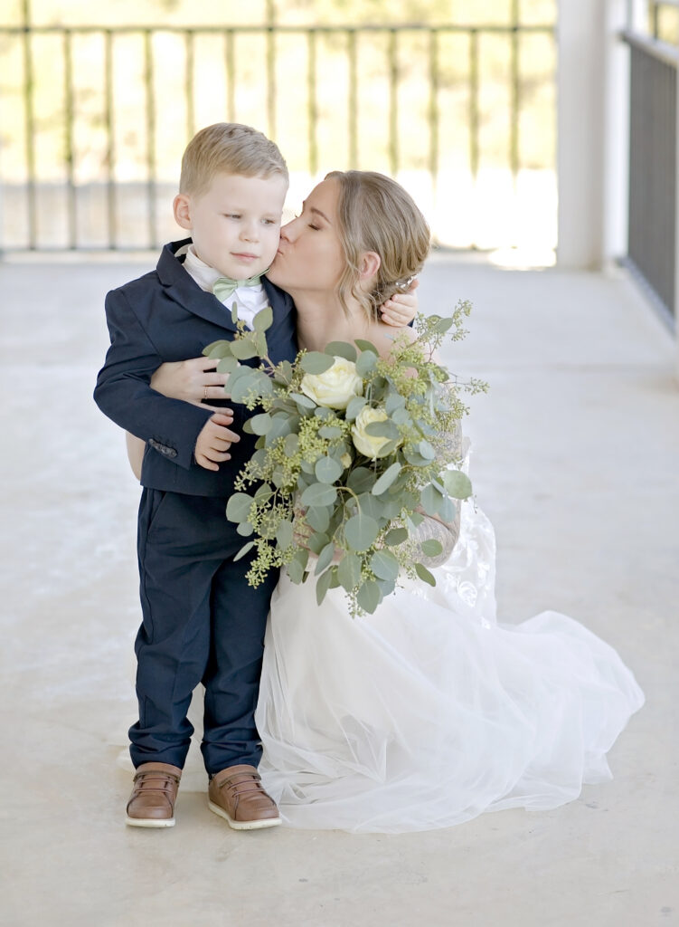 Bride with a young family member at a Texas Hill Country wedding