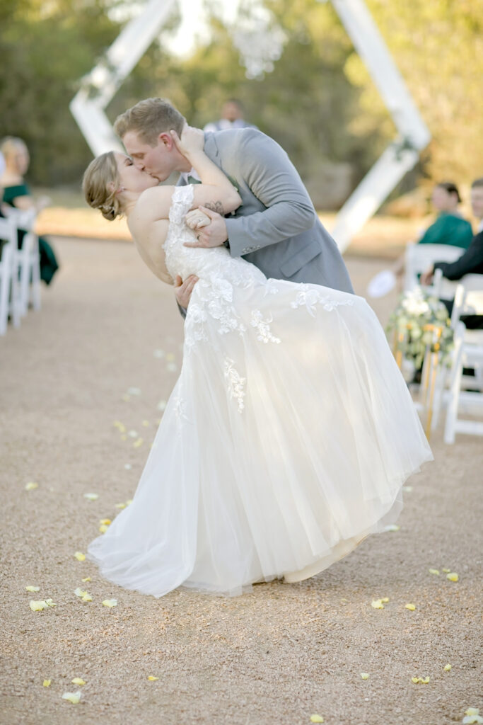 Texas Hill Country wedding couple celebrating with confetti