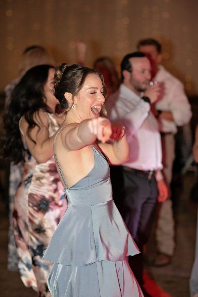 Wedding guest dancing during a San Antonio wedding reception